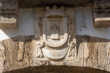 Coat of arms on facade of medieval Old Granary of Tarifa, Tarifa, Spain, Andalusia