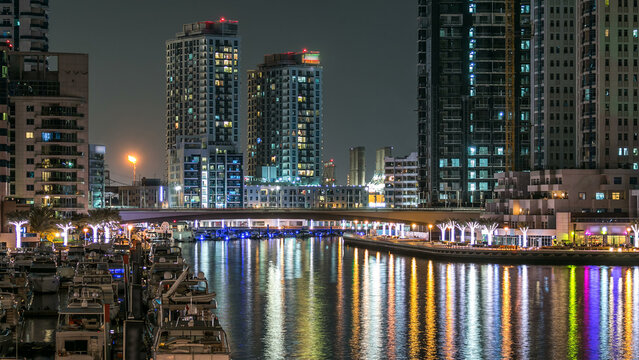Promenade in Dubai Marina timelapse at night, UAE.