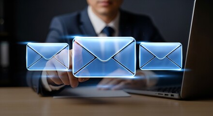 Businessman touching glowing email icons representing digital communication and messaging