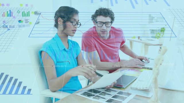 Coworkers reviewing pie charts and thumbnails, clicking mouse opening matching business dashboard