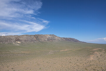 Rocky mountain range with desert foreground