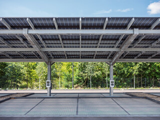 solar canopy at an empty charging station on an ev. parking lot