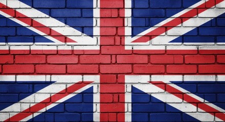 Fototapeta premium The iconic union jack flag is painted boldly across a weathered red brick wall symbolizing national pride and heritage