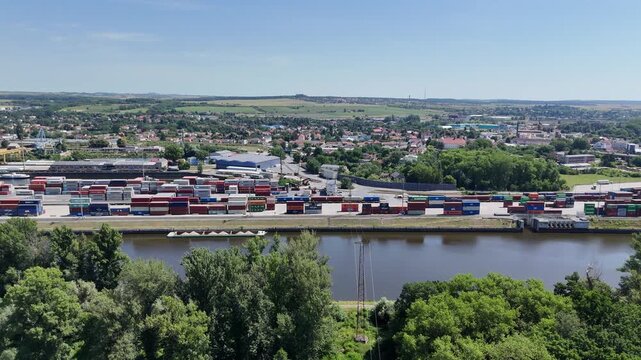 Melnik, Czech Republic - June 22, 2025 - Aerial view of container transshipment yard at the beginning of summer