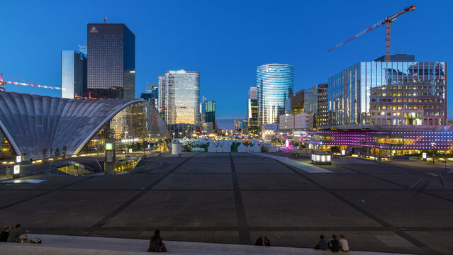The stunning Defence Parisian business district bristling with skyscrapers day to night timelapse.