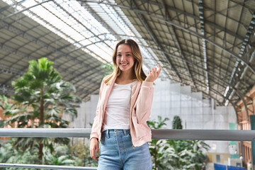 Young woman smiling in atocha train station,