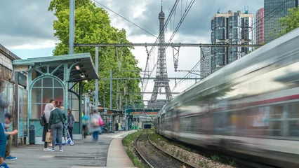 Selbstklebende Fototapeten Eiffelturm Javel train station with Eiffel tower on background timelapse. Paris, France  © HyperlapsePro
