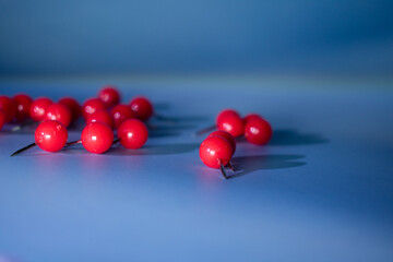 Bright red pushpins scattered on a cool blue background evoke focus, urgency, and creative planning — perfect for blogs, office ads, school content, or productivity themes.