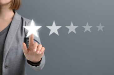 Excellent survey Rating for Satisfaction presenting by Hand of Client pressing Five Star, gray...