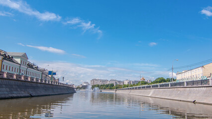 Boats floats on the Moskva River past the Moscow Kremlin and other famous places timelapse hyperlapse, Russia