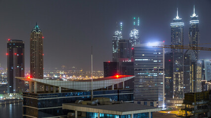 Dubai business bay towers night timelapse aerial