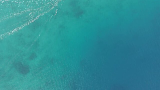 Aerial drone view of a tropical beach on Kakeromajima Island, Amami, Japan
