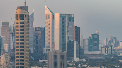Dubai Downtown at sunset timelapse. Aerial view over big futuristic city.
