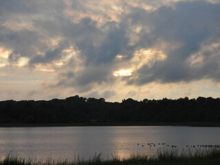 The tranquil beauty of the wetlands, as the sun sets. Bombay Hook National Wildlife Refuge, Kent County, Delaware. Remnants of tropical storm Debby.