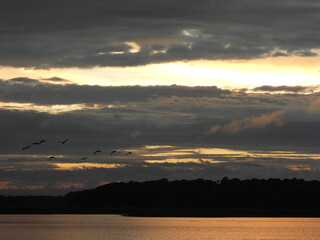 The tranquil beauty of the wetlands, as the sun sets. Bombay Hook National Wildlife Refuge, Kent County, Delaware. Remnants of tropical storm Debby.