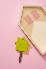 small  house shape with key hard shadow.