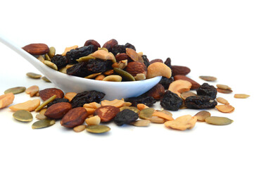 Mix nuts, dry fruits and grapes on a white background