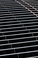Aerial view of solar panels on building roof, Panama - stock photo