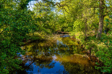 A  view down the River Goyt beside  the Midland Railway viaduct at the town of New Mills, High Peak...
