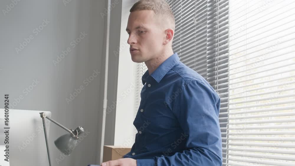 Wall mural handheld shot of focused male manager with smartphone in hands talking to colleague during coffee br