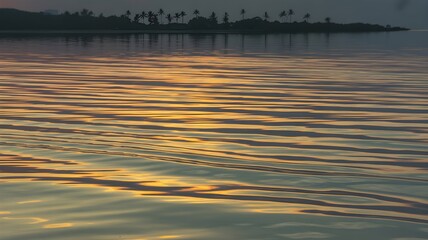 Dreamy sunset reflections shimmer on calm tropical waters, perfect for tranquil travel vibes