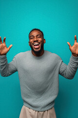 Naklejka premium Smiling Creative Agency Founder Posing Against Teal Background