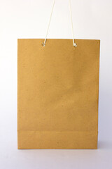 Blank brown paper bag for shopping isolated on white background