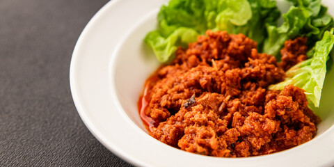 Tuna tomato sauce canned fish seafood fresh delicious gourmet food background on the table rustic food top view copy space keto and paleo diet vegan food pescetarian diet