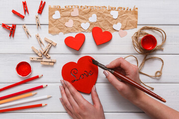 Valentines day, wedding or other holiday decorations background. Handmade gift greeting heart...