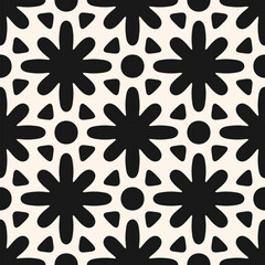 Vector geometric floral ornament. Abstract seamless pattern with bold flower silhouettes, rounded shapes, grid, tiles. Black and white background. Simple monochrome texture. Repeating geo design