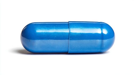 Single blue pharmaceutical pill displayed on a white background