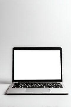 Modern laptop with blank screen. Minimalist style, perfect for website design, presentations, and more. Ideal for various commercial uses.