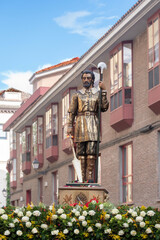 Image of Saint Isidore the Farmer in procession on a street in Madrid, Spain