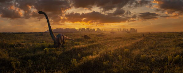 Sunset in Prehistoric Landscape with Dinosaurs
