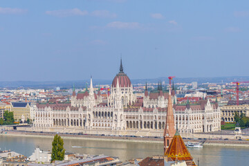 Fototapeta premium Hungarian Parliament and Danube River at Sunset in Budapest