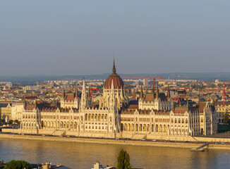 Fototapeta premium Hungarian Parliament and Danube River at Sunset in Budapest