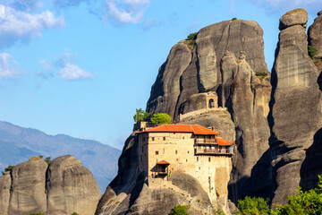 Monastery (St. Nikolaos Anapafsas) sperched atop a monolithic rock pillar in Meteora, Greece. Iconic Meteora monasteries in central Greece