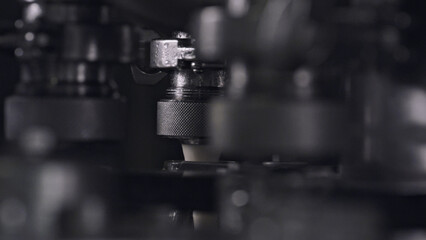 Industrial machine pouring cheese in automated