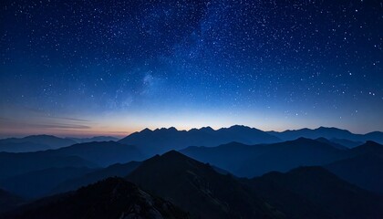 Starry night over mountain range