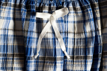 Plaid cotton shorts with white drawstring

