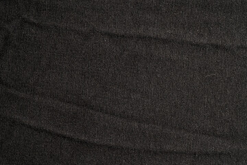 Dark ribbed fabric texture background
