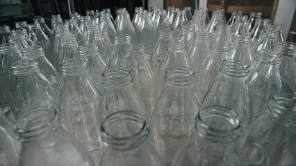 Empty glass bottles waiting for filling in dairy