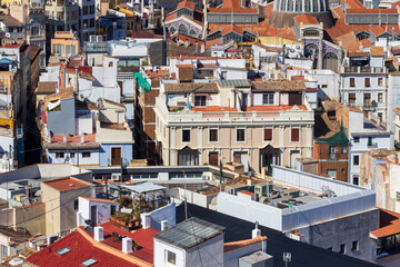 Aerial view of urban architecture in Valencia, showcasing colorful rooftops and diverse buildings...
