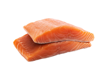 two pieces of salmon on a white surface