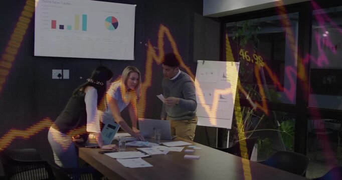 Business colleagues shifting laptop starting analysis reviewing charts and cards with neon overlays