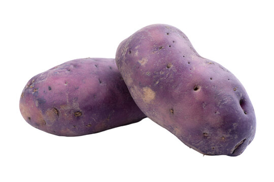 two purple potatoes sitting next to each other
