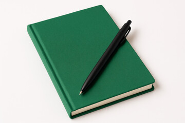 Green Hardcover Notebook with Black Pen – Writing and Note-Taking Concept Isolated on White Background
