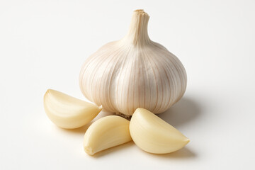 Whole Garlic Bulb with Peeled Cloves in Front – High-Resolution Organic Food Concept on White Background