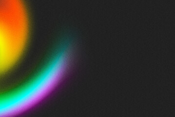 Arc of rainbow hues softly illuminates a dark space