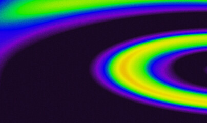 Rings of blue, purple, green, and yellow orbit a dark center